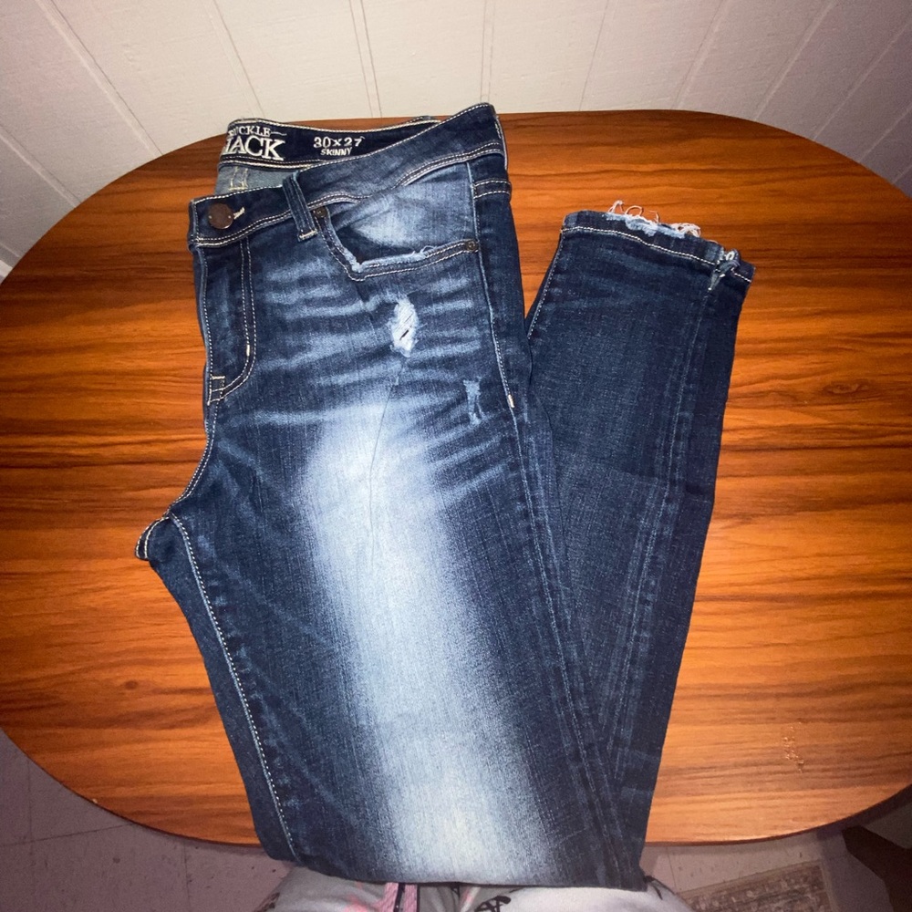 Black jeans with a 32" waist and 32" inseam